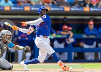 New York Mets' Ronny Mauricio bats during spring training against the Miami Marlins.