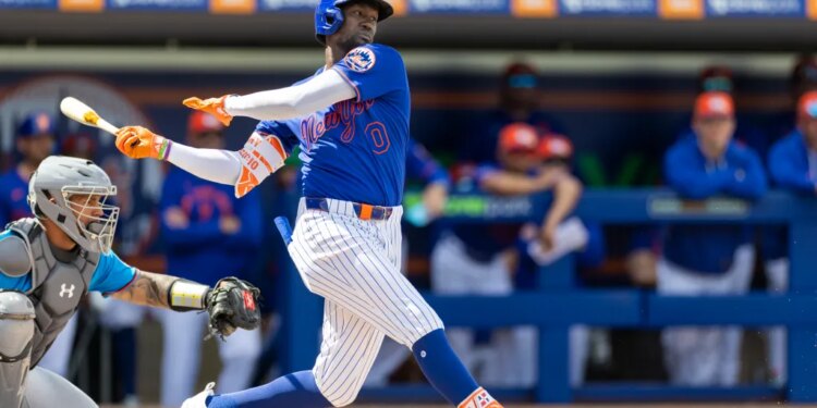 New York Mets' Ronny Mauricio bats during spring training against the Miami Marlins.
