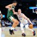 Oklahoma City Thunder guard Nikola Topić drives against Milwaukee Bucks forward Ousmane Dieng.