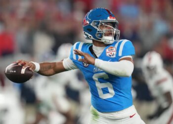 Mississippi quarterback Trinidad Chambliss throws during the first half of the Fiesta Bowl NCAA college football playoff semifinal game against Miami, Jan. 8, 2026, in Glendale, Ariz.