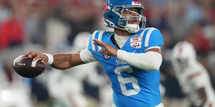 Mississippi quarterback Trinidad Chambliss throws during the first half of the Fiesta Bowl NCAA college football playoff semifinal game against Miami, Jan. 8, 2026, in Glendale, Ariz.