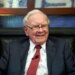 Warren Buffett smiles during an interview.