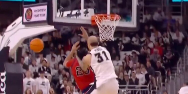 Powell committing the hard foul on Hopkins just before chaos broke out.