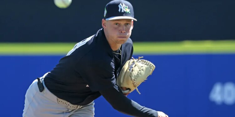 New York Yankees pitcher Will Warren #98, throwing a warmup pitch at the start of the 1st inning.