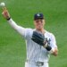 Aaron Judge throws a ball to fan during a Yankees home game against the Orioles last season.