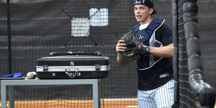 New York Yankees catcher Ben Rice #22 in the bullpen.
