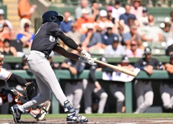 New York Yankees second baseman Jazz Chisholm Jr. (13) hits a single.