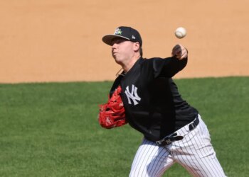 New York Yankees pitcher Ryan Weathers #40 pitching live batting practice.