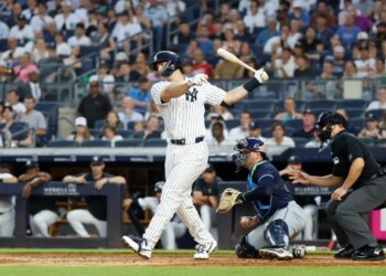 New York Yankees first base Paul Goldschmidt striking out swinging during a baseball game.