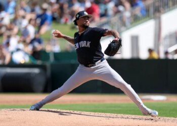 New York Yankees pitcher Luis Gil (81) throws a pitch.