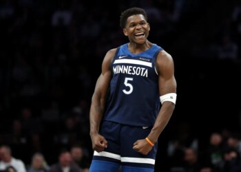 Minnesota Timberwolves guard Anthony Edwards (5) celebrates.