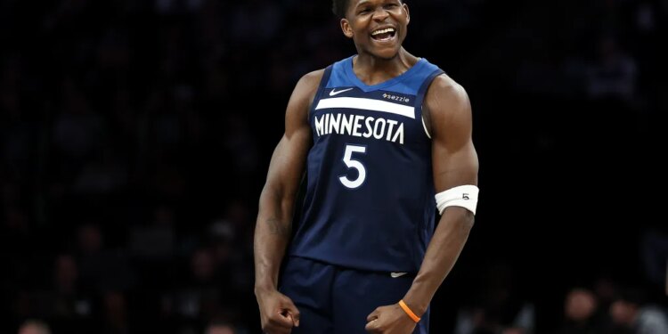 Minnesota Timberwolves guard Anthony Edwards (5) celebrates.