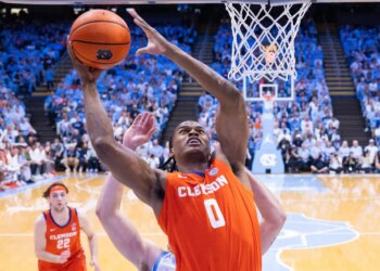 Clemson Tigers forward RJ Godfrey (0) shoots the ball against the North Carolina Tar Heels.