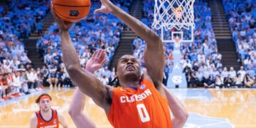 Clemson Tigers forward RJ Godfrey (0) shoots the ball against the North Carolina Tar Heels.