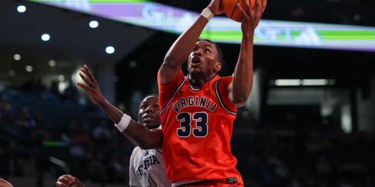Virginia Cavaliers center Ugonna Onyenso (33) grabs a rebound against the Georgia Tech Yellow Jackets in the first half at McCamish Pavilion.