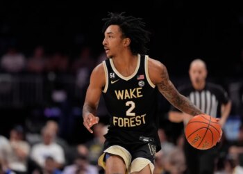 Wake Forest basketball player dribbling the ball during a game.