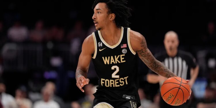 Wake Forest basketball player dribbling the ball during a game.
