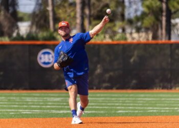 New York Mets pitcher A.J. Minter throws during Spring Training.