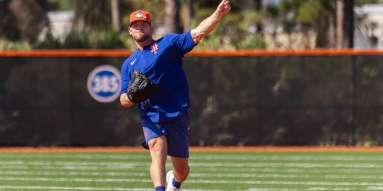 New York Mets pitcher A.J. Minter throws during Spring Training.
