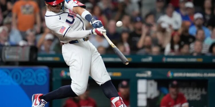 Aaron Judge hitting a baseball.