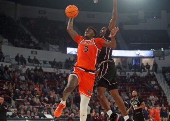 Auburn Tigers forward KeShawn Murphy (3) drives to the basket as Mississippi State Bulldogs guard Shawn Jones Jr. (5) defends during the first half.