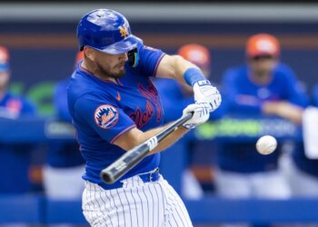 Veteran catcher Austin Barnes, hitting a single earlier in spring training, is hoping to land a spot with the Mets.