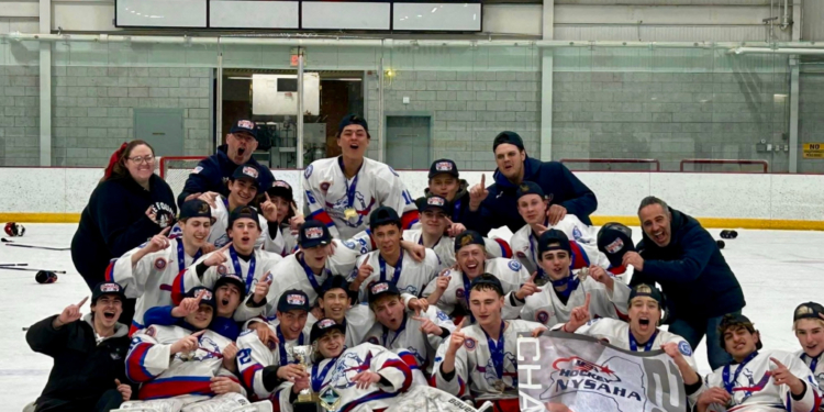 Bellmore-Merrick celebrates after winning the state championship in high school boys hockey.