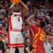 Jaden Bradley of Arizona shoots a game-winning basket over Killyan Toure of Iowa State.