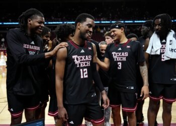 Texas Tech forward Donovan Atwell (12) celebrates with teammates after an NCAA college basketball game against Iowa State, Saturday, Feb. 28, 2026, in Ames, Iowa.