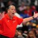 Kelvin Sampson, coach of the Houston Cougars, yells directions from the sidelines.