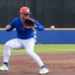 New York Mets' Bo Bichette fields balls at third base.
