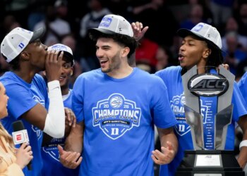 Cameron Boozer (center) was named the MVP of the ACC Tournament after Duke's title-clinching win over Virginia on March 14, 2026.