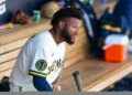 Milwaukee Brewers outfielder Jackson Chourio in the dugout during a spring training game.