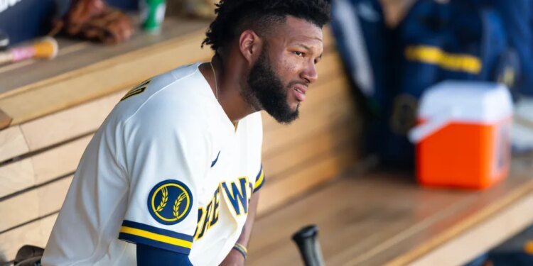 Milwaukee Brewers outfielder Jackson Chourio in the dugout during a spring training game.