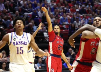 St. John's Red Storm forward Bryce Hopkins #23 shooting a jump shot during an NCAA Tournament game against the Kansas Jayhawks.