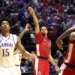 St. John's Red Storm forward Bryce Hopkins #23 shooting a jump shot during an NCAA Tournament game against the Kansas Jayhawks.