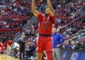 St. John's Red Storm Vs.Kansas Jayhawks at Viejas Arena for the NCAA Tournament: Forward Bryce Hopkins #23 of the St. John's Red Storm puts up a shot during the first half.
