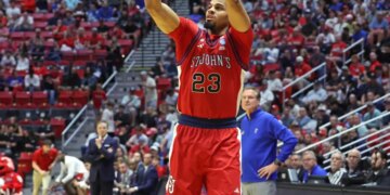 St. John's Red Storm Vs.Kansas Jayhawks at Viejas Arena for the NCAA Tournament: Forward Bryce Hopkins #23 of the St. John's Red Storm puts up a shot during the first half.