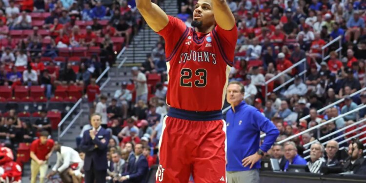 St. John's Red Storm Vs.Kansas Jayhawks at Viejas Arena for the NCAA Tournament: Forward Bryce Hopkins #23 of the St. John's Red Storm puts up a shot during the first half.
