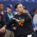 Miami quarterback Carson Beck (04) runs a drill at the NFL football scouting combine in Indianapolis.