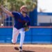New York Mets pitcher Christian Scott throwing a baseball during spring training.