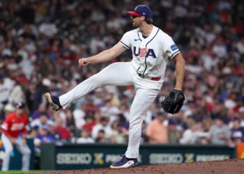 United States pitcher Clay Holmes (35) throws a pitch against Great Britain.