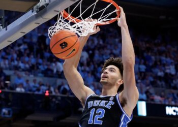 Duke forward Cameron Boozer dunks a basketball.
