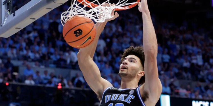 Duke forward Cameron Boozer dunks a basketball.