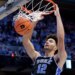 Duke forward Cameron Boozer dunks a basketball.