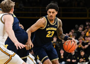 Mar 5, 2026; Iowa City, Iowa, USA; Michigan Wolverines forward Yaxel Lendeborg (23) controls the ball against the Iowa Hawkeyes during the first half at Carver-Hawkeye Arena. Mandatory Credit: Jeffrey Becker-Imagn Images