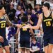Michigan basketball players Aday Mara and Yaxel Lendeborg celebrate during a game against Northwestern.