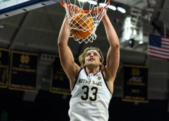 Notre Dame Fighting Irish forward Carson Towt (33) dunks against the NC State Wolfpack during the first half at Purcell Pavilion at the Joyce Center.