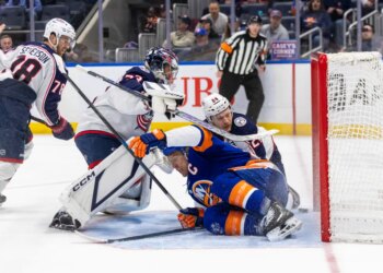 The Islanders' Anders Lee (27) is in the goal past Columbus Blue Jackets goaltender Jet Greaves (73) in what was initially scored a goal but was reversed in the third period on March 22, 2026.