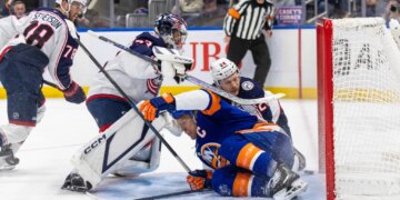 The Islanders' Anders Lee (27) is in the goal past Columbus Blue Jackets goaltender Jet Greaves (73) in what was initially scored a goal but was reversed in the third period on March 22, 2026.